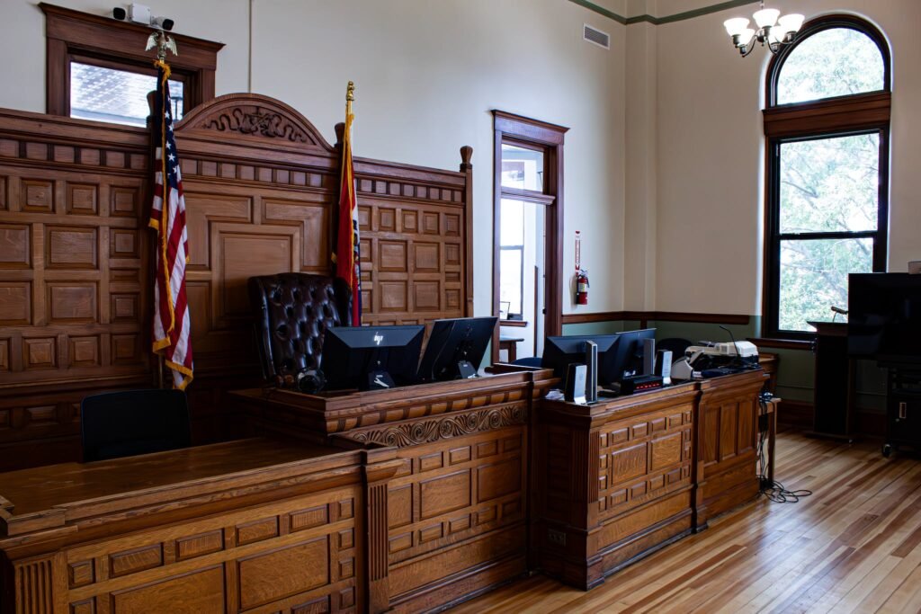 Empty court-room bench symbolizing the alternative to litigation.